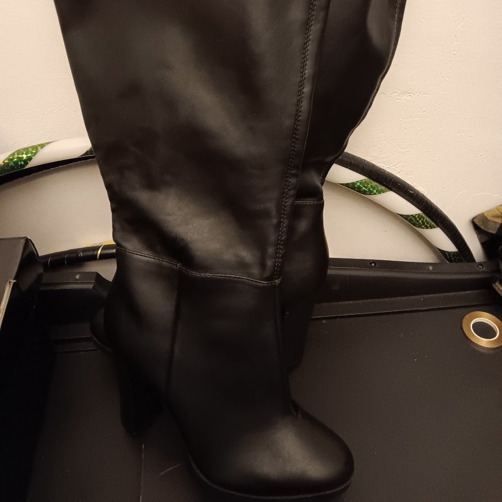 Zip up, leather, knee boots, wide calf, 3 inch heel.